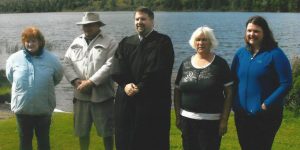 Betty Milburn, Neale Wilbur, Pastor Hawkesworth, Daphne Wilbur and Lisa Wilbur